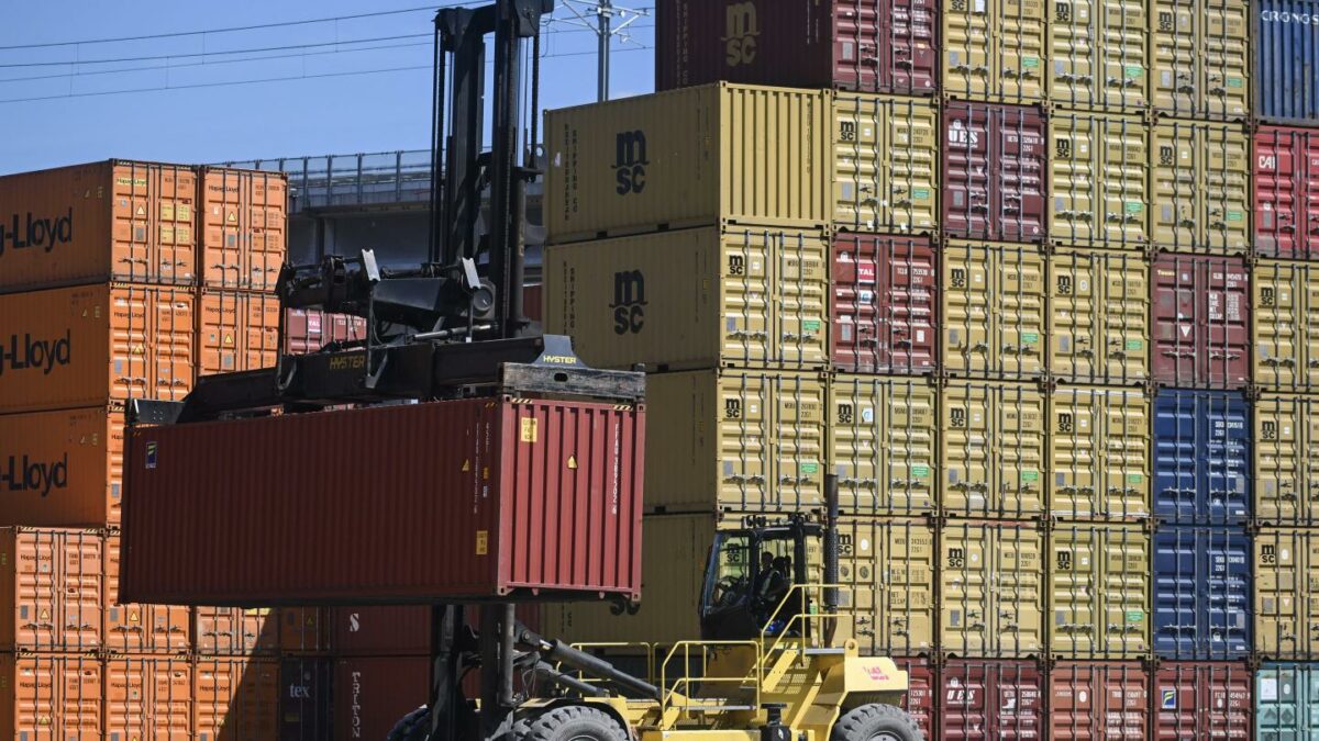A shipping container is moved at a freight yard in Montreal, Quebec, Canada.